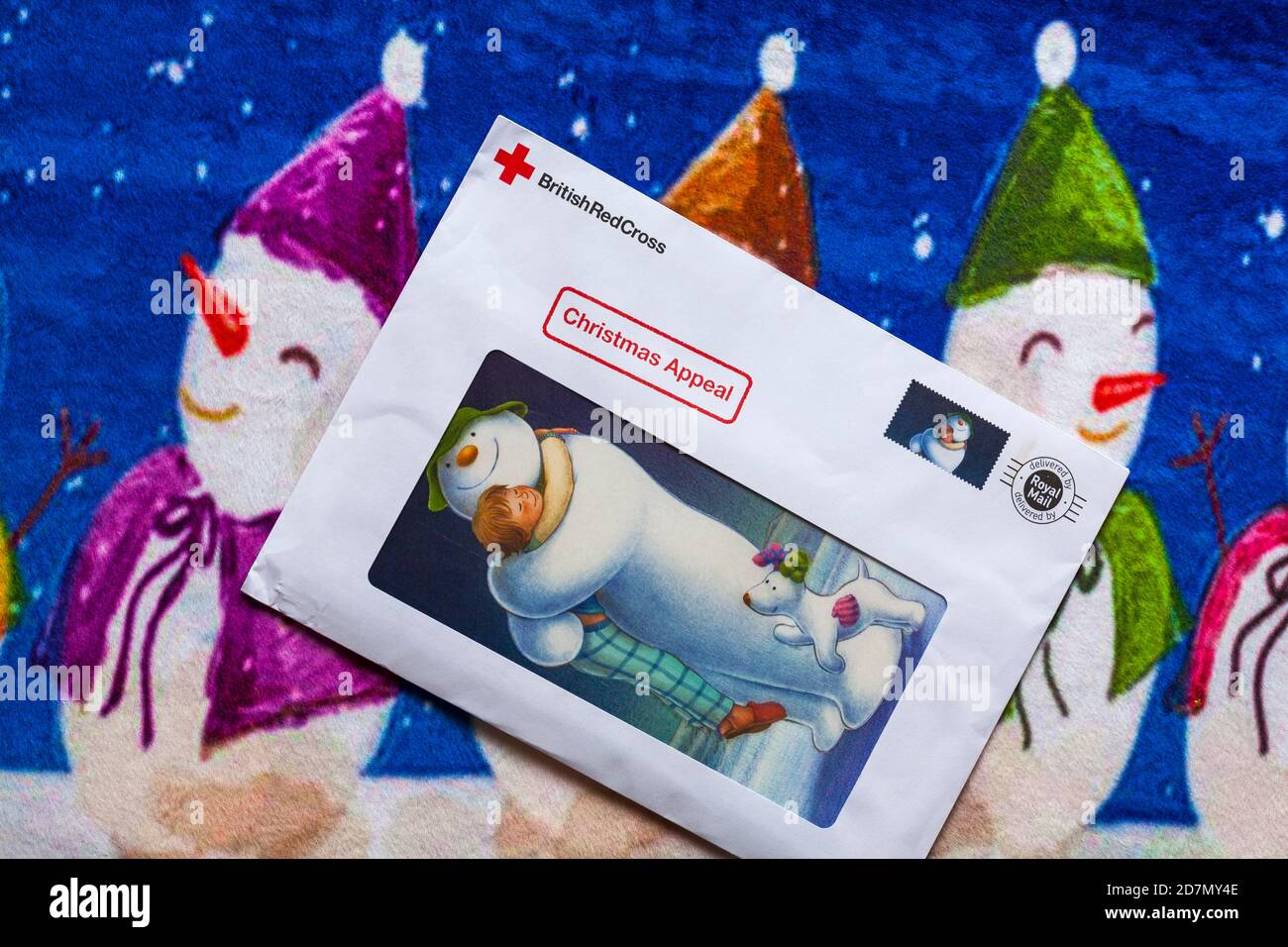 Post on Christmas mat- charity appeal, Christmas appeal from British Red Cross Stock Photo