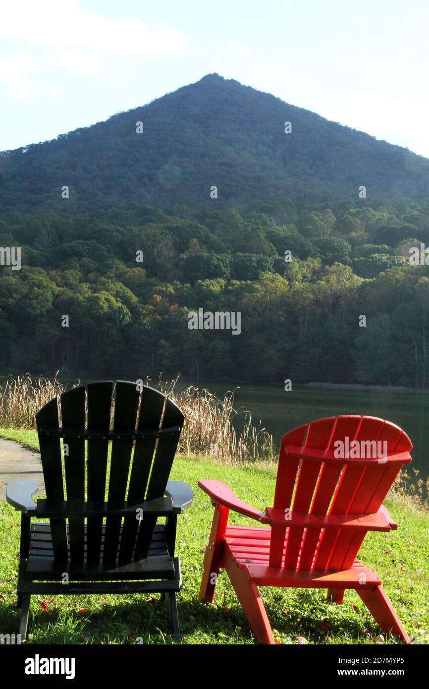 Peaks of Otter, Virginia, Blue Ridge Parkway, USA. Seating by Abbott Lake with view of Sharp Top. Stock Photo