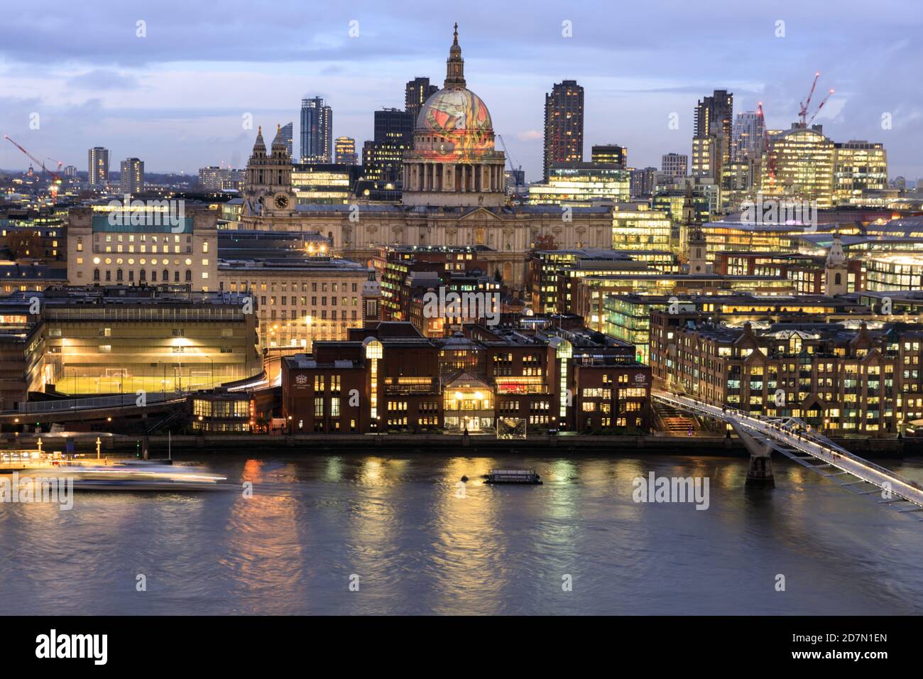 The dome of St Paul's Cathedral in the City of London, seen here from across the River Thames, with projection of William Blake’s ‘Ancient of Days’, L Stock Photo