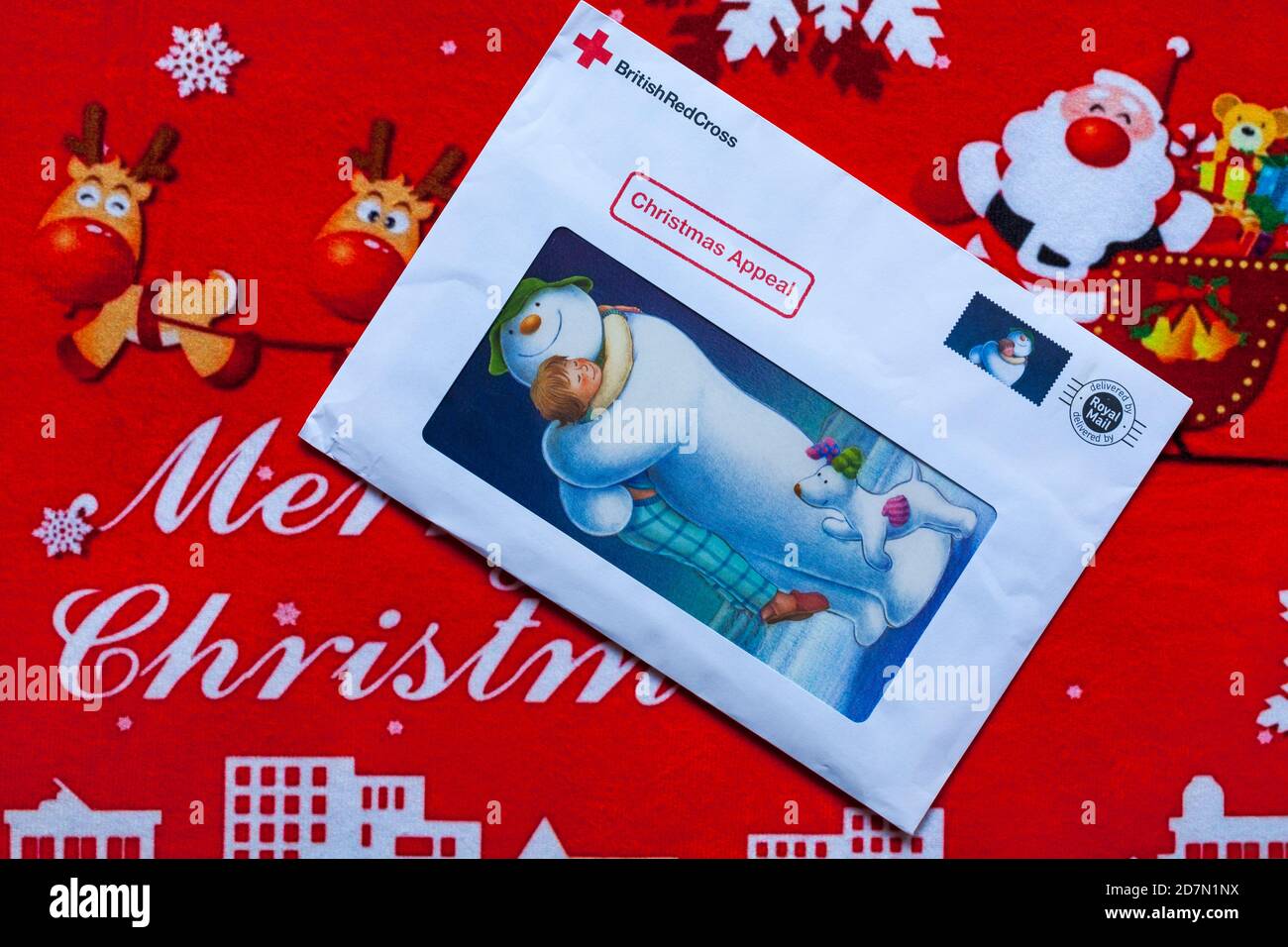 Post on Christmas mat - charity appeal, Christmas appeal from British Red Cross Stock Photo