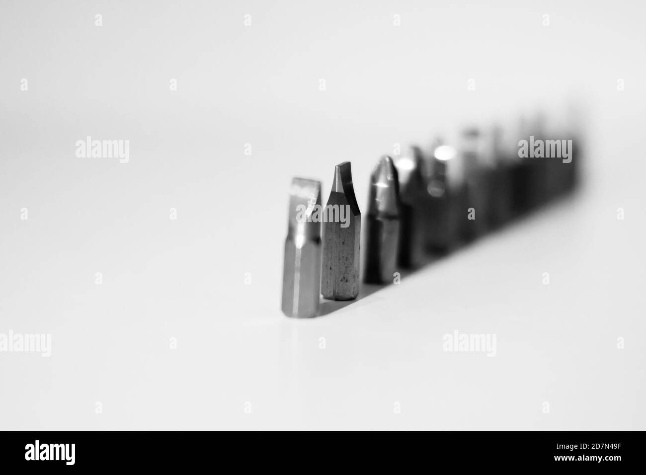 Different types of screw bits of screwdriver isolated on white