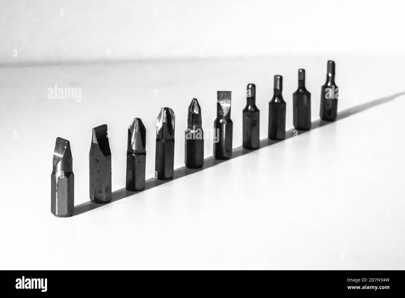 Different types of screw bits of screwdriver isolated on white