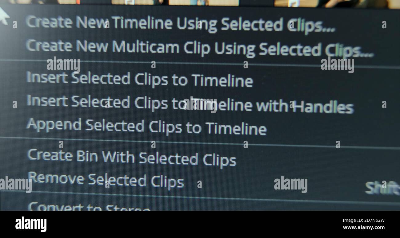 Movie maker creates new timeline using selected footages in contemporary computer program macro view Stock Photo