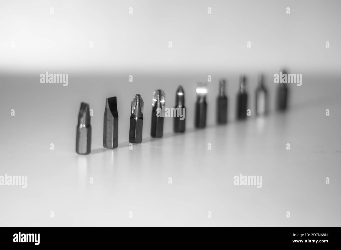 Different types of screw bits of screwdriver isolated on white