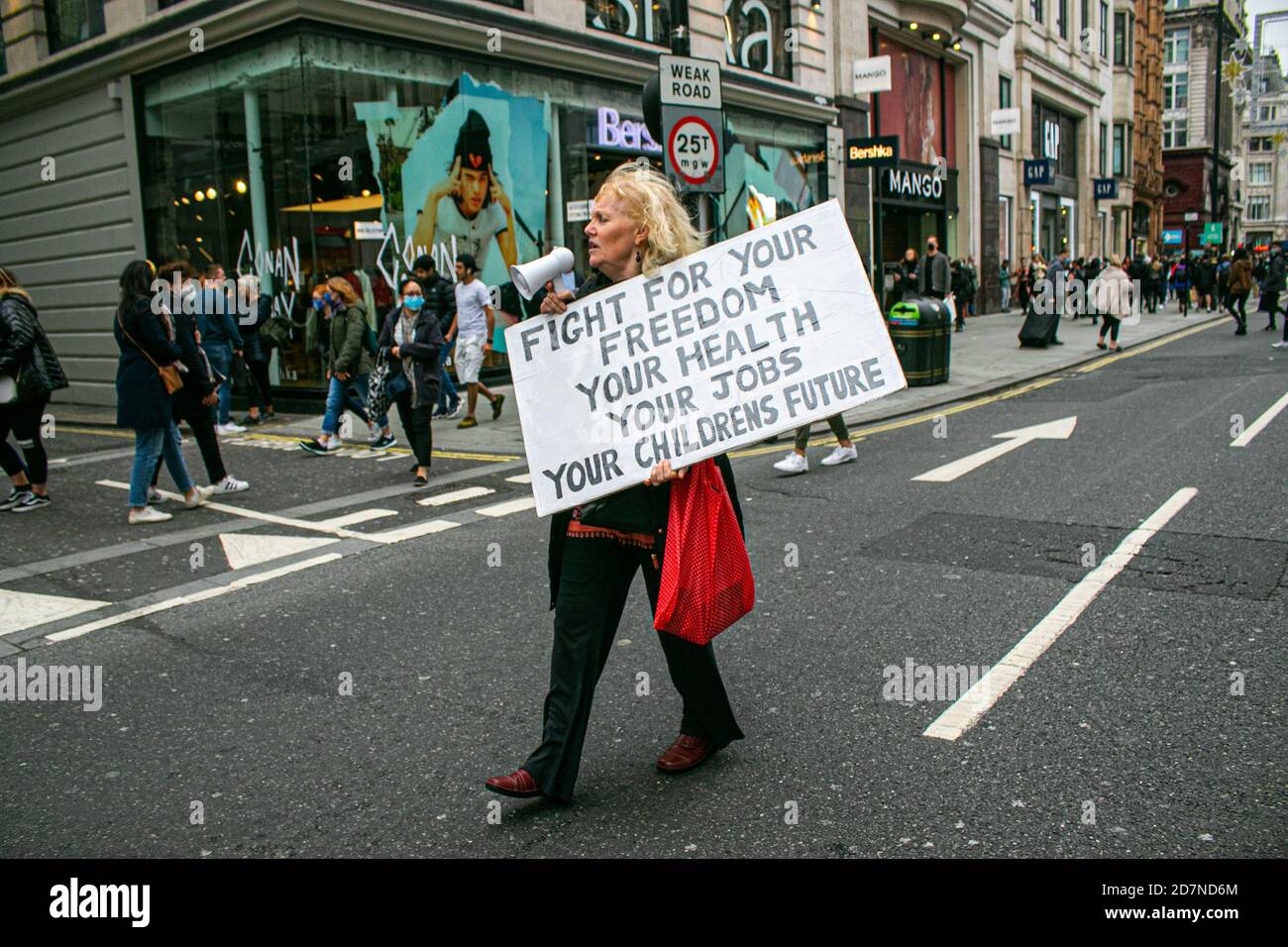 LONDON,UK 24 October 2020. Hundreds of protesters many chanting 