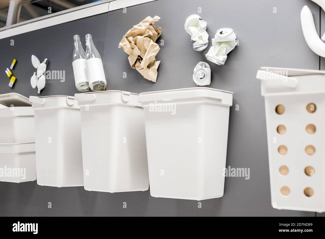white Garbage cans for sorting garbage.Four decorative trash bins for sorting of waste. place