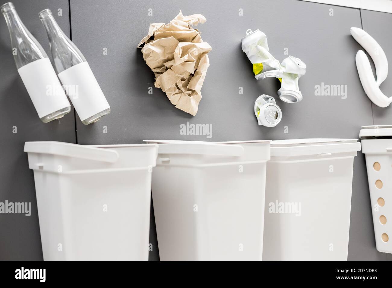 white Garbage cans for sorting garbage.Four decorative trash bins for