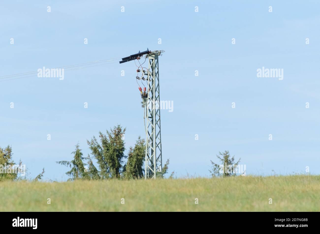 High voltage overhead electrical power line, energy industry, in a rural landscape in the countryside in Germany, Western Europe Stock Photo