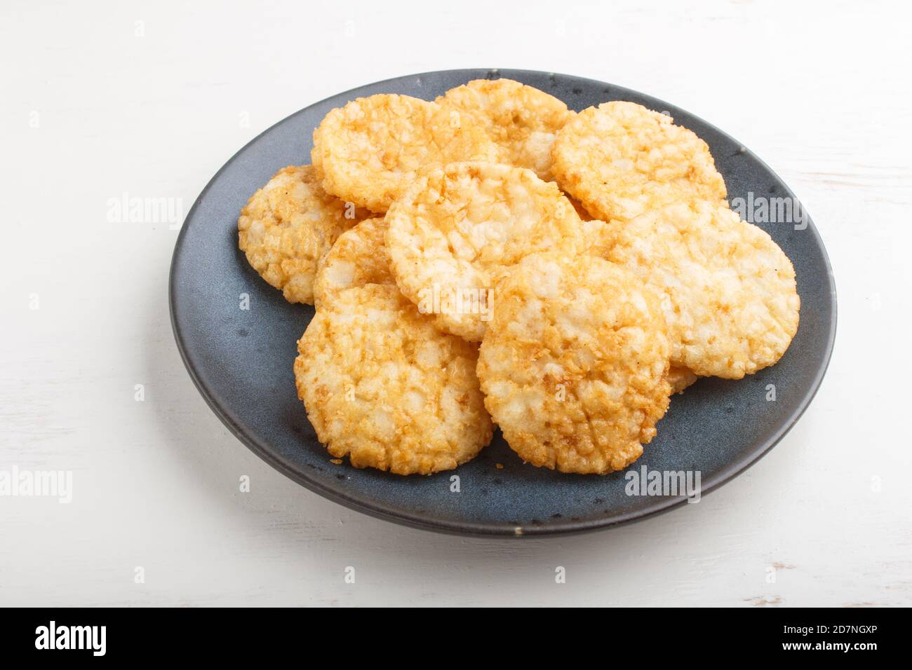 Traditional japanese rice chips cookies with honey and soy sauce on a ...