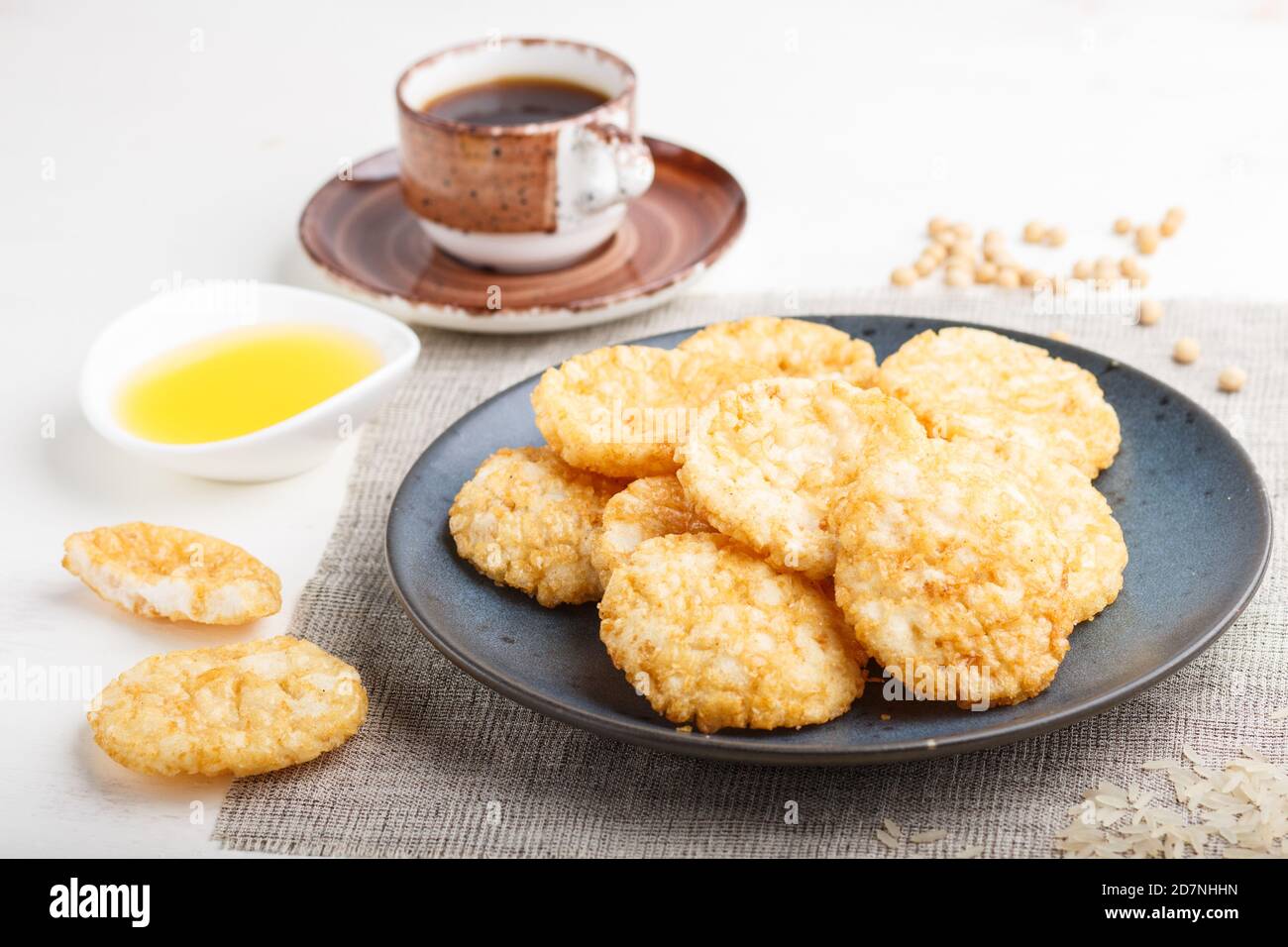 Traditional japanese rice chips cookies with honey and soy sauce on a ...