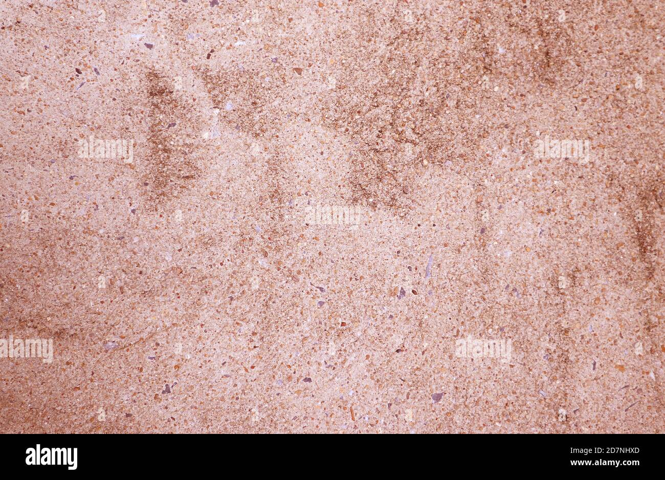 Front View of Pink Brown Colored Grunge Concrete Wall Stock Photo