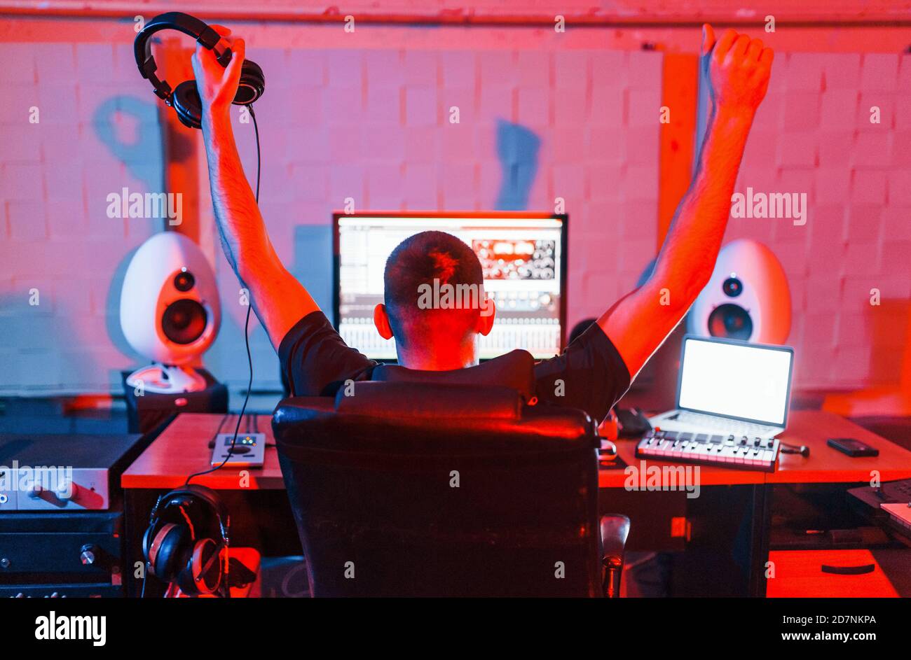 Sound engineer working and mixing music indoors in the studio Stock ...