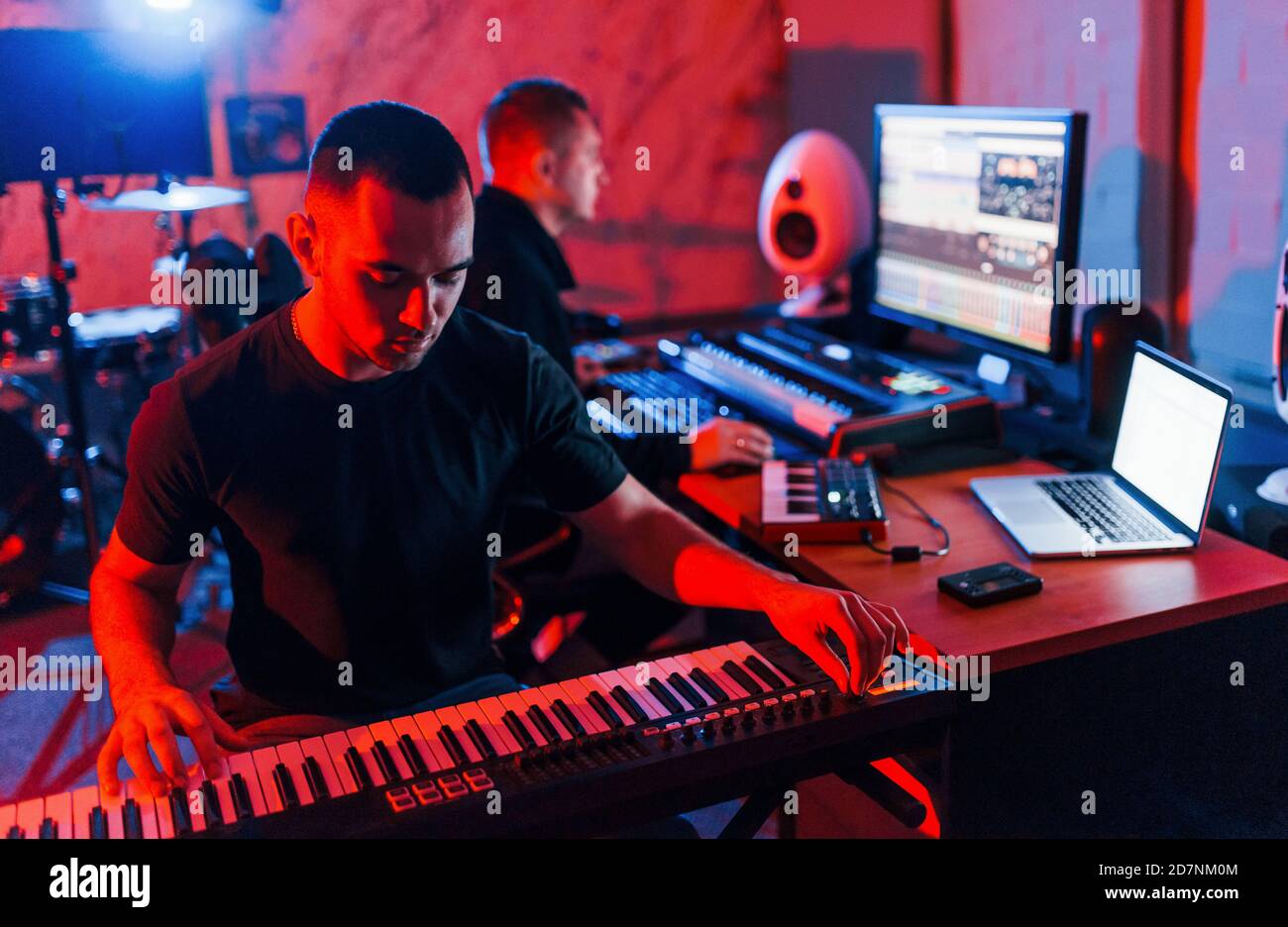 Sound engineer have recording session with piano player indoors in the  studio Stock Photo - Alamy