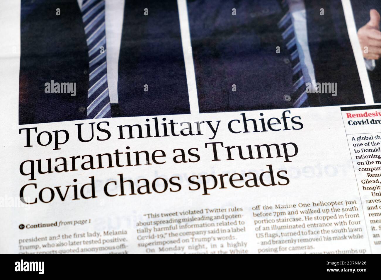'Top US military chiefs quarantine as Trump Covid chaos spreads' newspaper headline article in The Guardian October 2020 London England UK Stock Photo