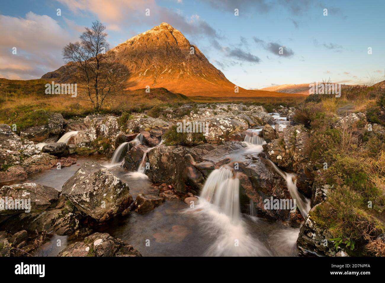 Glen Etive waterfall on a sunny Autumn morning in the Scottish Highlands. Stock Photo