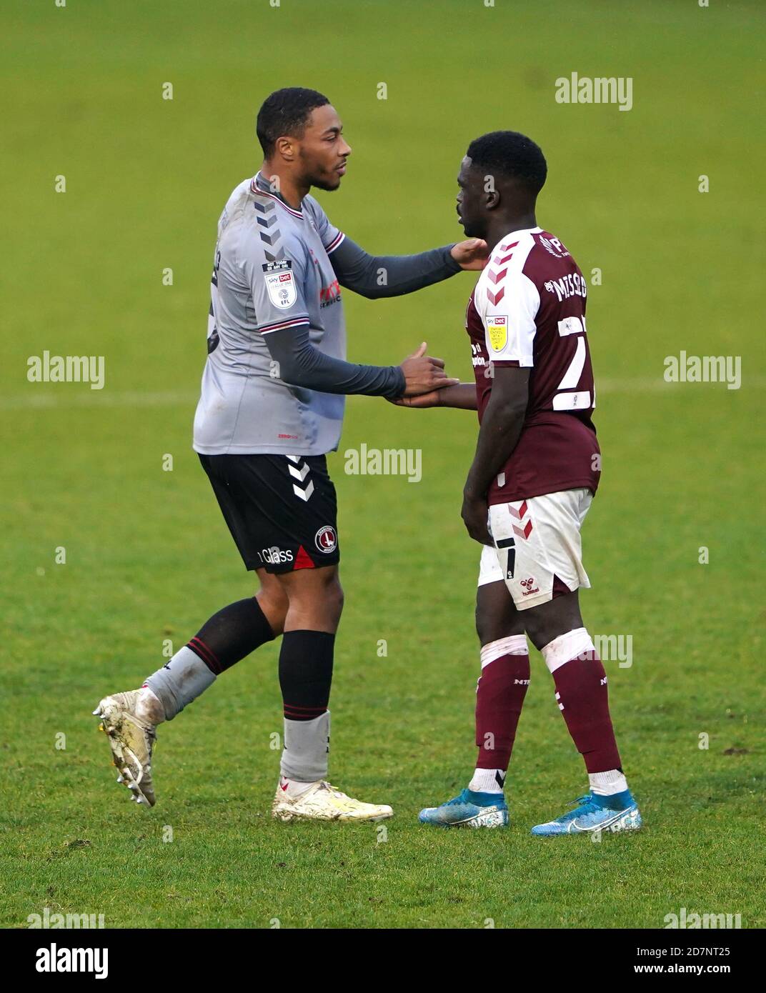 Charlton Athletic's Akin Famewo greets Northampton Town's Christopher Missilou after the final whistle during the Sky Bet League One match at the PTS Academy Stadium, Northampton. Stock Photo
