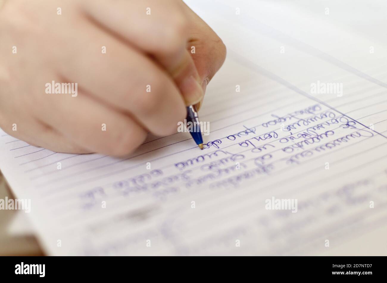 Person writing on a paper with beautiful handwriting Stock Photo - Alamy