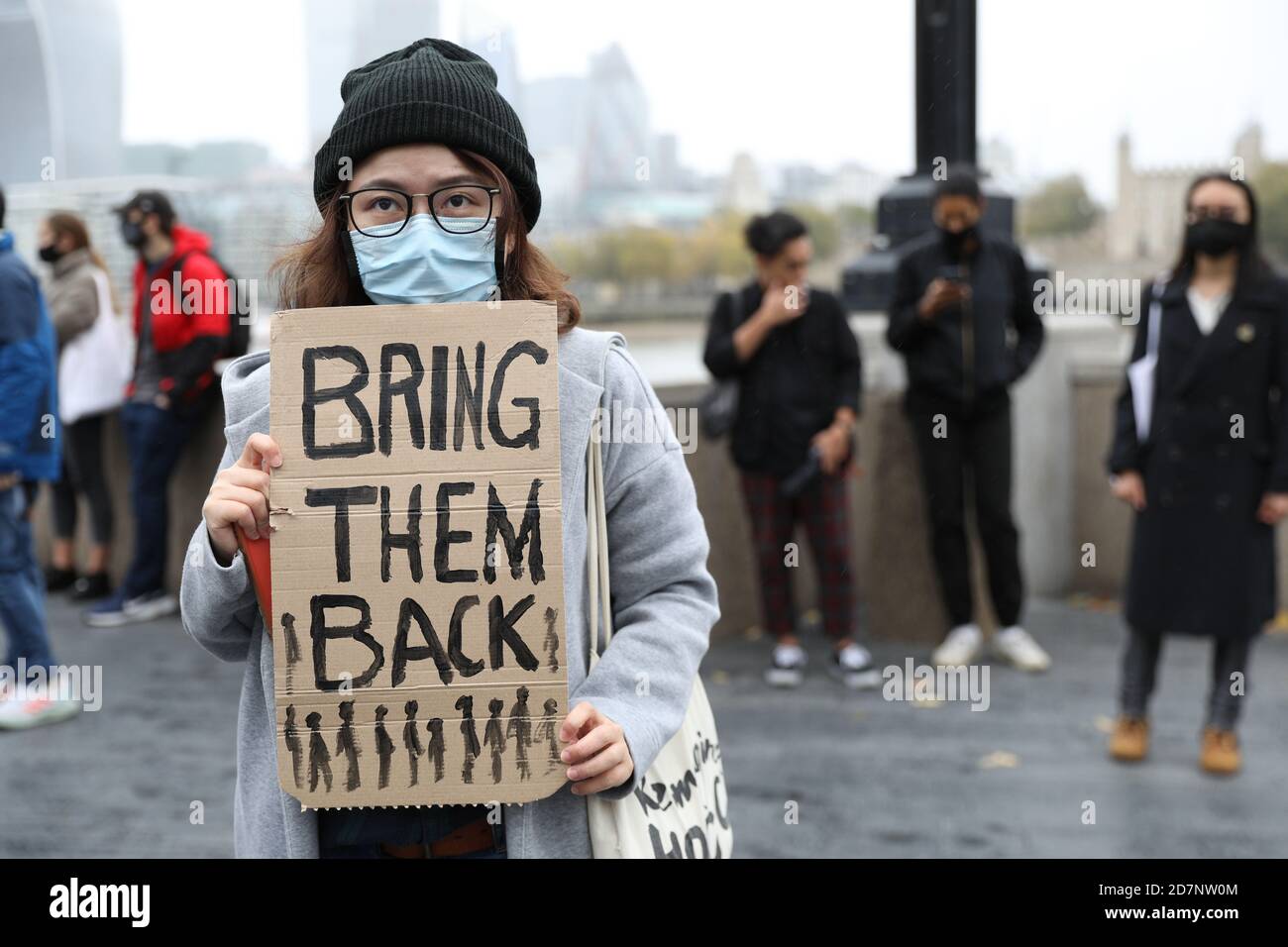 London, UK. 24th Oct, 2020. Protesters in London gathered next to Tower Bridge to show solidarity with 12 Hong Kongers would are currently being detained in mainland China accused of attempting to flee Hong Kong for Taiwan. Credit: David Coulson/Alamy Live News Stock Photo