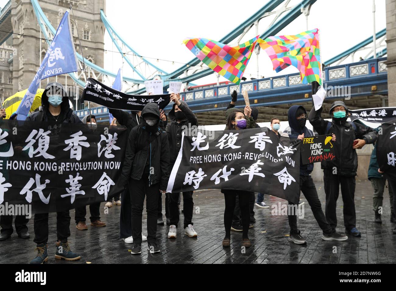 London, UK. 24th Oct, 2020. Protesters in London gathered next to Tower Bridge to show solidarity with 12 Hong Kongers who are currently being detained in mainland China accused of attempting to flee Hong Kong for Taiwan. Credit: David Coulson/Alamy Live News Stock Photo
