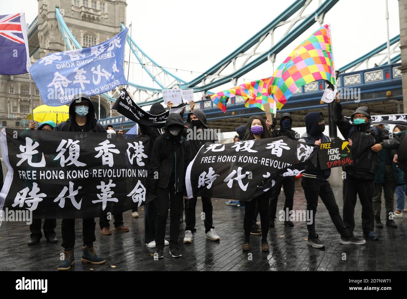 London, UK. 24th Oct, 2020. Protesters in London gathered next to Tower Bridge to show solidarity with 12 Hong Kongers would are currently being detained in mainland China accused of attempting to flee Hong Kong for Taiwan. Credit: David Coulson/Alamy Live News Stock Photo