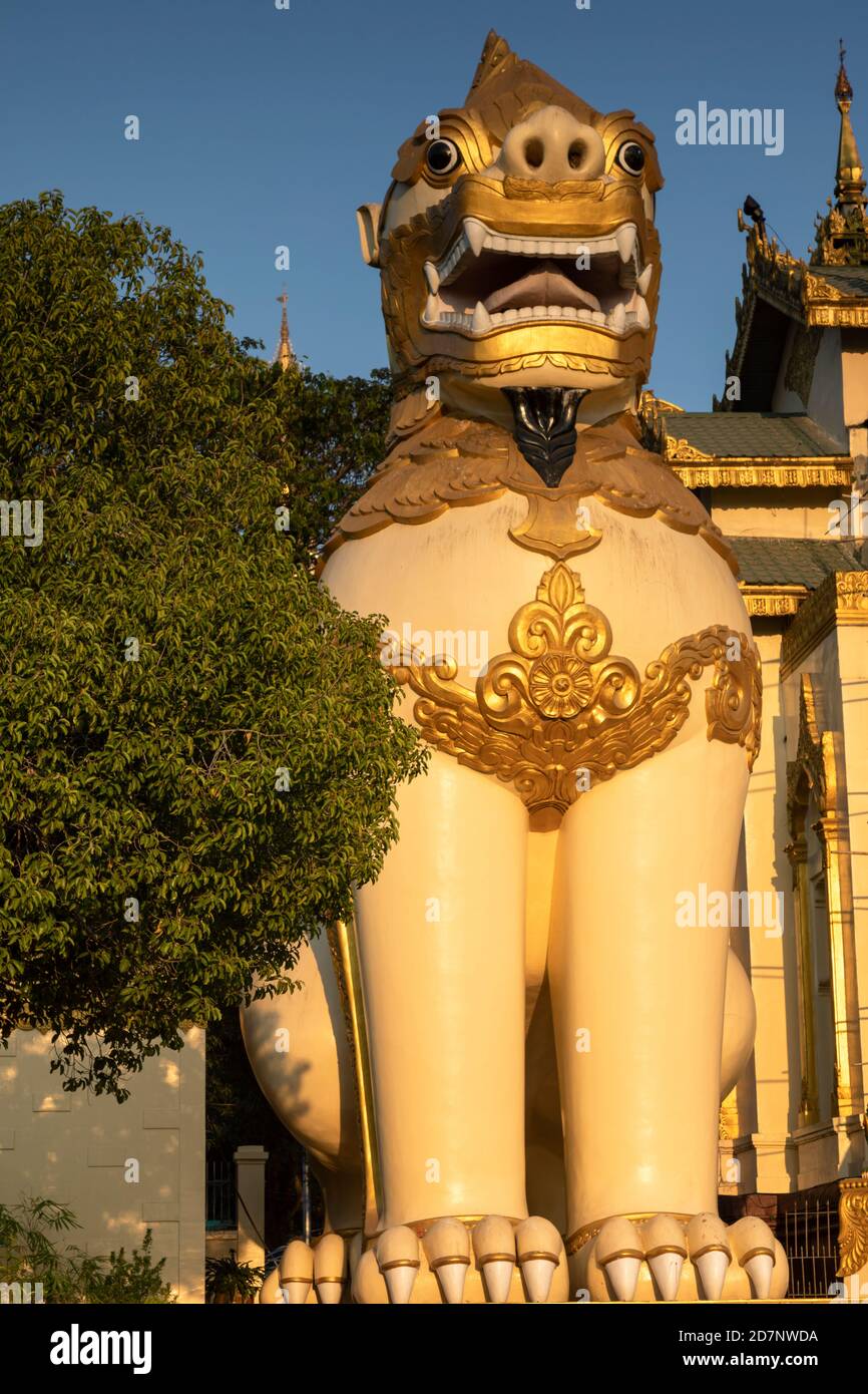 Lion guardian of the Shwedagon Pagoda, Yangon, Myanmar Stock Photo
