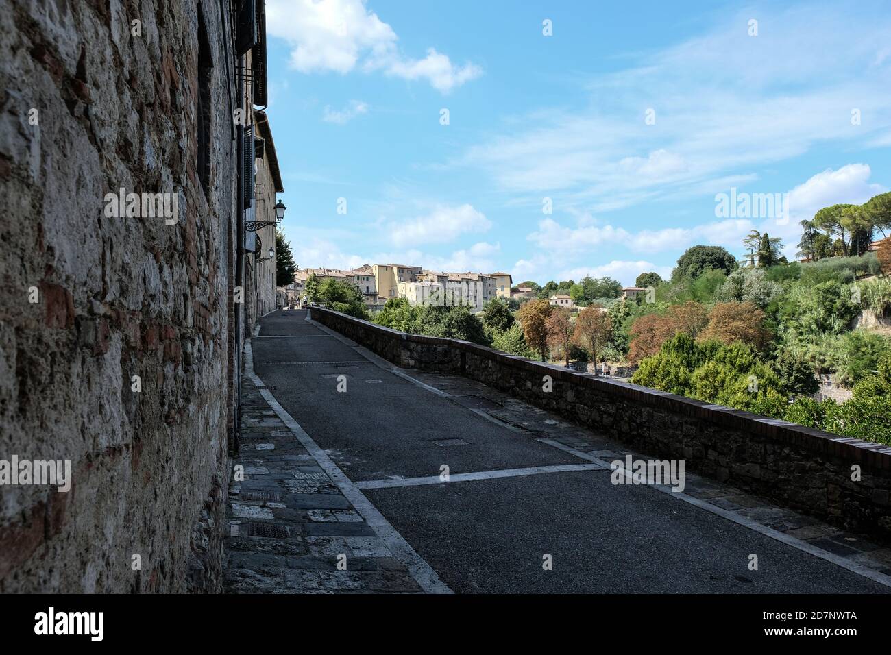 Authentic street with view in small village in tuscany in Italy with ...