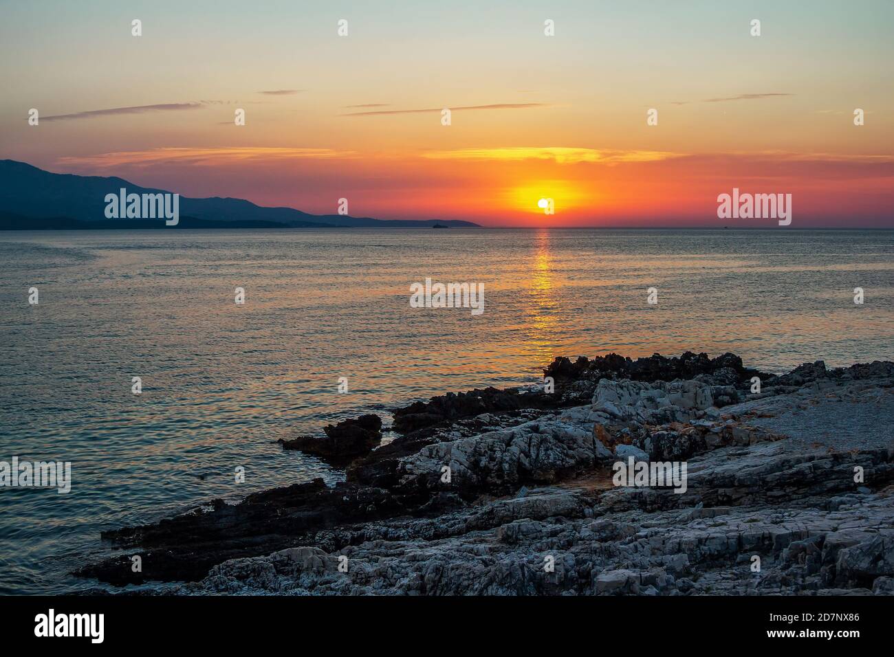 Beautiful landscape – beach on sunset – pink sky and sunlight ...
