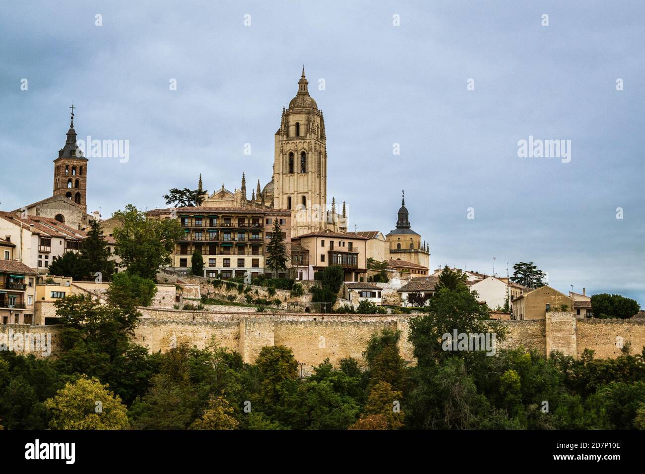 Skyline of the old town Segovia with the prominent cathedral bell tower. Stock Photo
