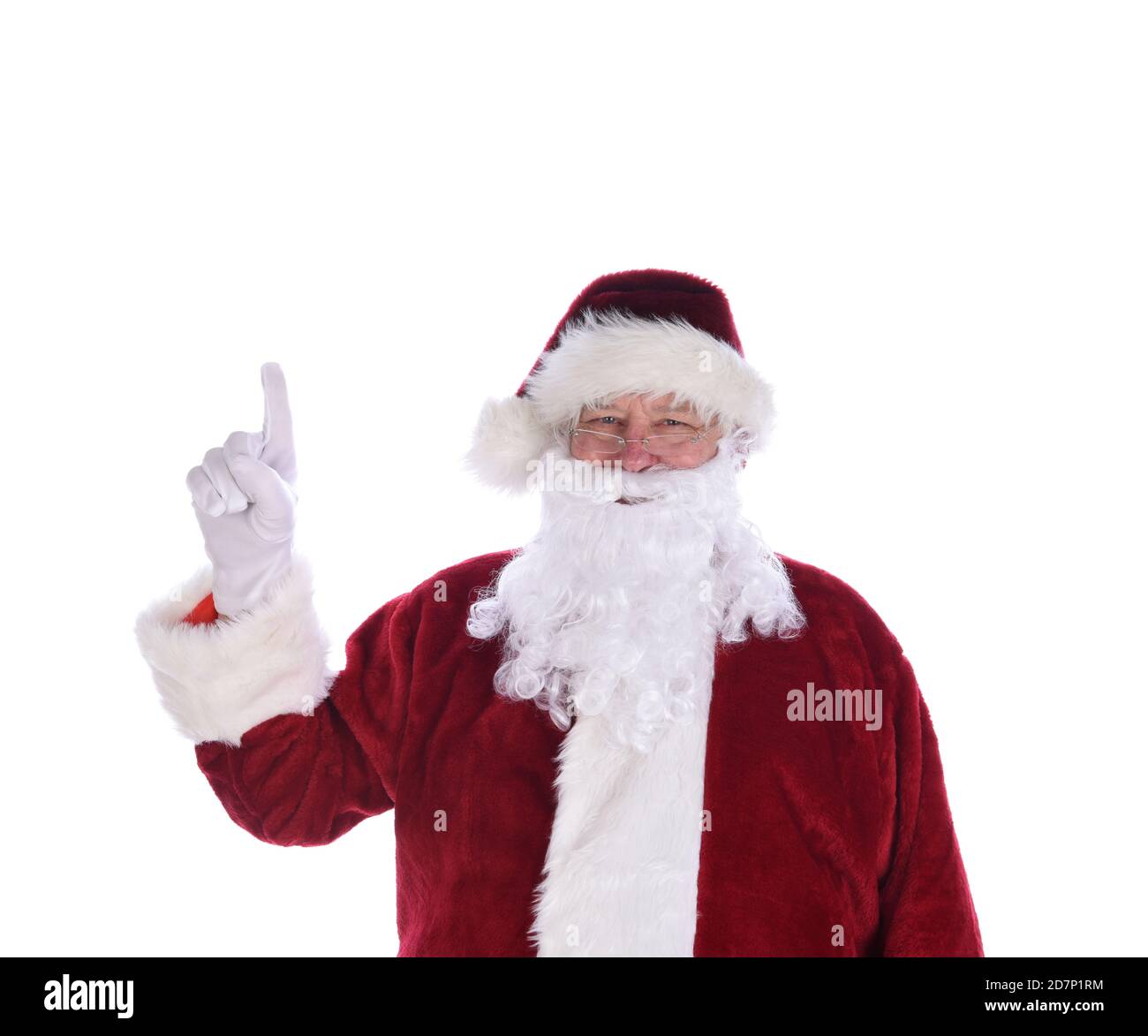 Santa Claus with his index finger in the air pointing up, Number one gesture, isolated on white Stock Photo