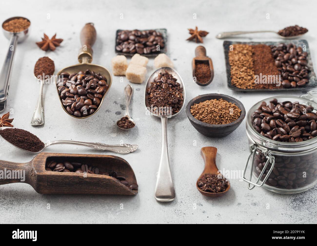 Freeze dried instant coffee granules with ground coffee and beans in