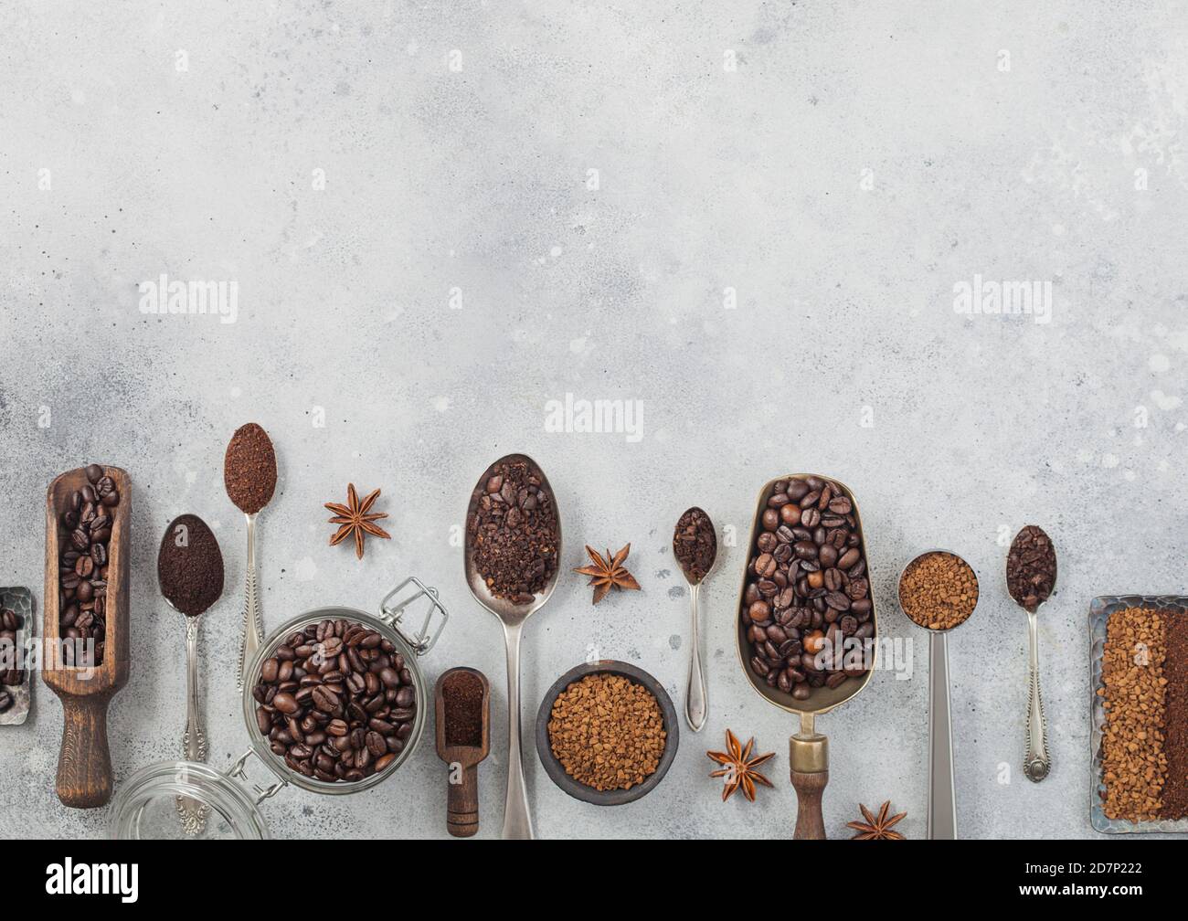 Freeze dried instant coffee granules with ground coffee and beans in