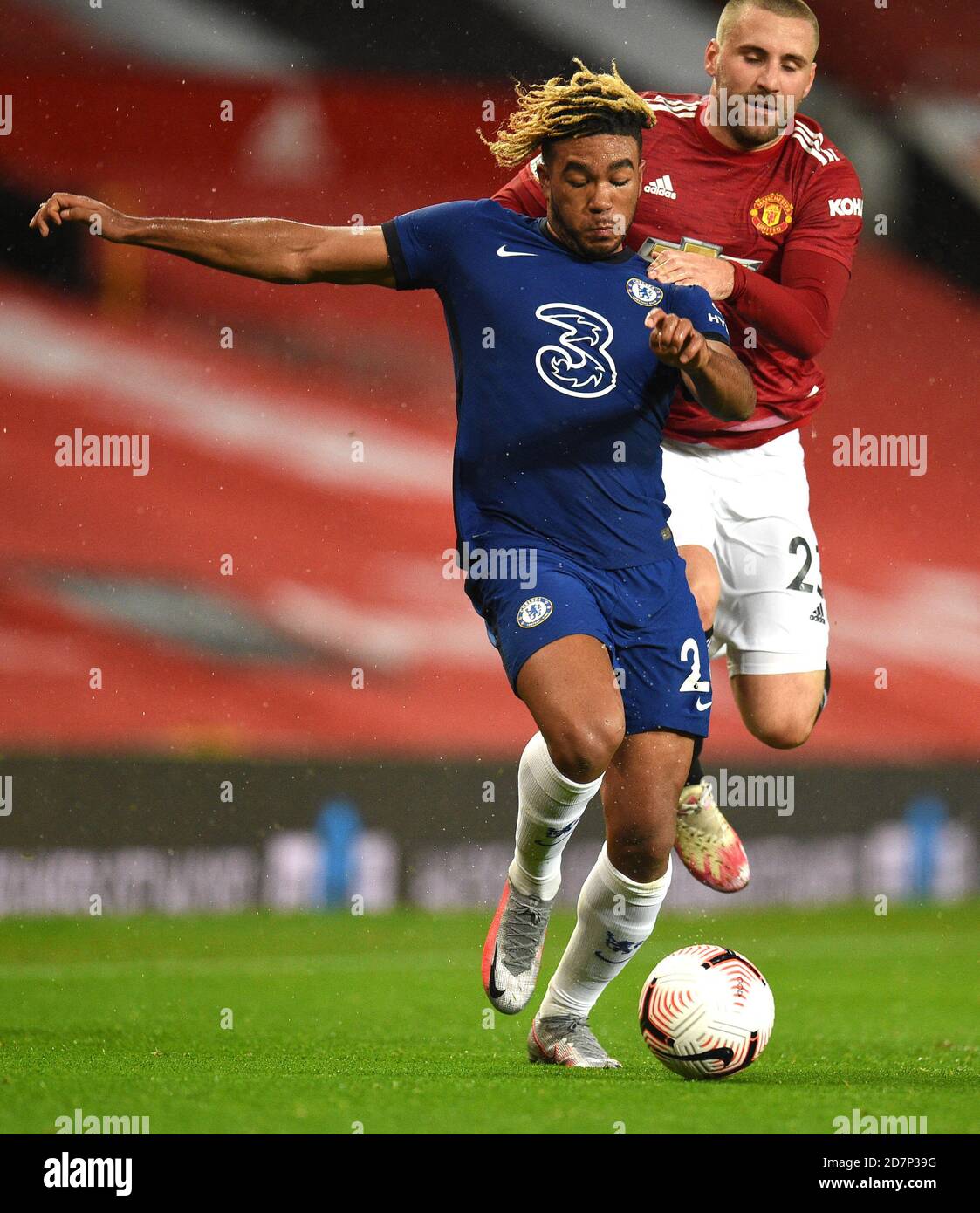 Chelsea S Reece James And Manchester United S Luke Shaw Battle For The Ball During The Premier League Match At Old Trafford Manchester Stock Photo Alamy