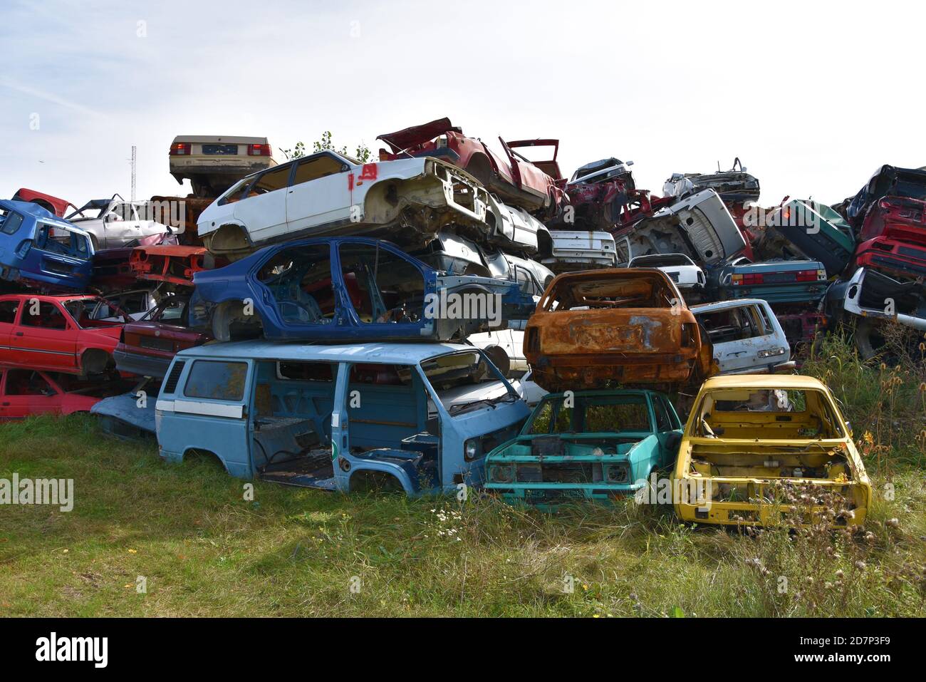 Scrap yard with pile of old rusted car shells Stock Photo Alamy
