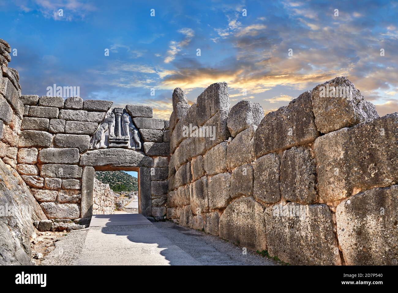 Mycenae Lion Gate & citadel walls built in 1350 B.C and its cyclopean style walls due to the vast size of the blocks. Mycenae Archaeological Site Stock Photo