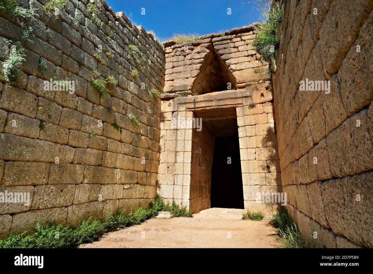 Exterior of the Treasury of Atreus an Mycenaean 'tholos' beehive shaped tomb on the Panagitsa Hill at Mycenae Archaeological site Stock Photo