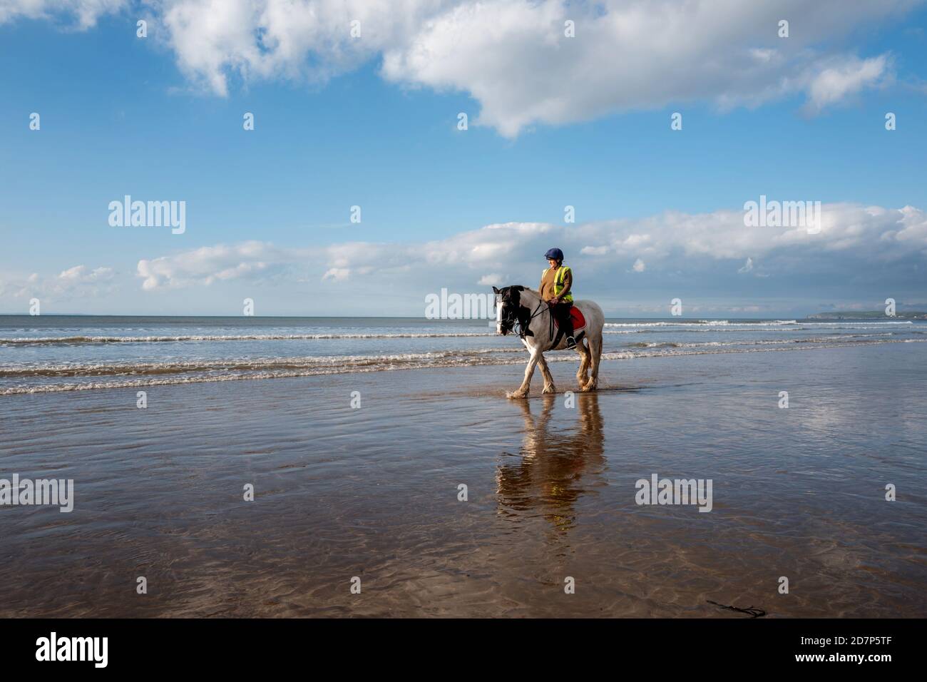 Riding a horse on the beach at Westward Ho!, Devon Stock Photo Alamy