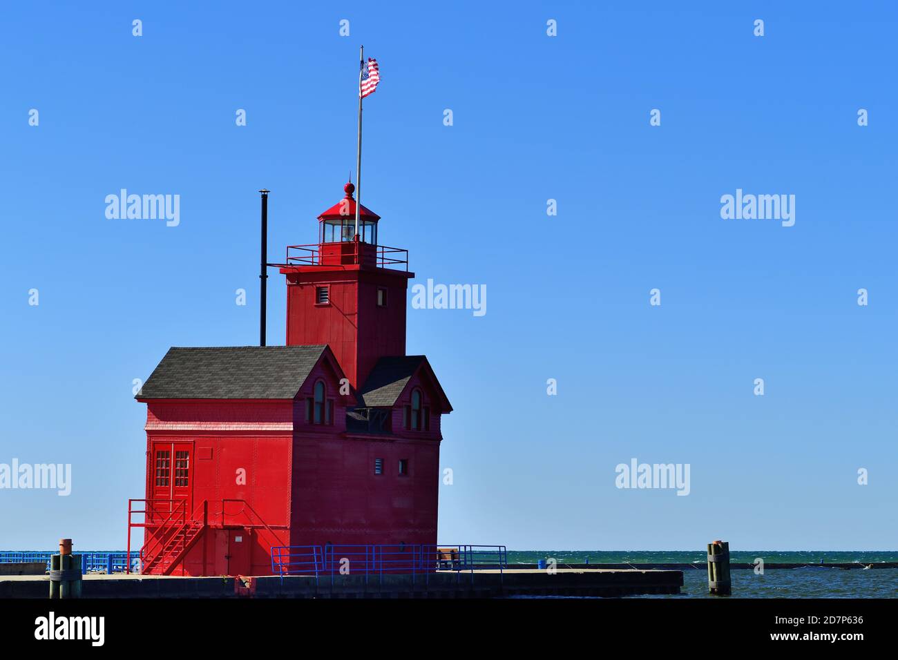 Holland, Michigan, USA. The Holland Harbor Light, also known as 'Big Red' on a clear but windy day. Stock Photo