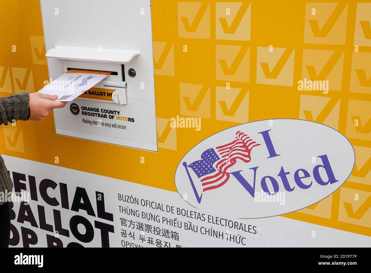 American female voting drop box hi-res stock photography and images - Alamy
