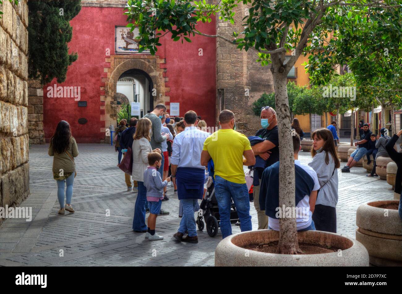 Tourists queueing to visit the Real Alcazar during Covid-19 pandemic Stock Photo