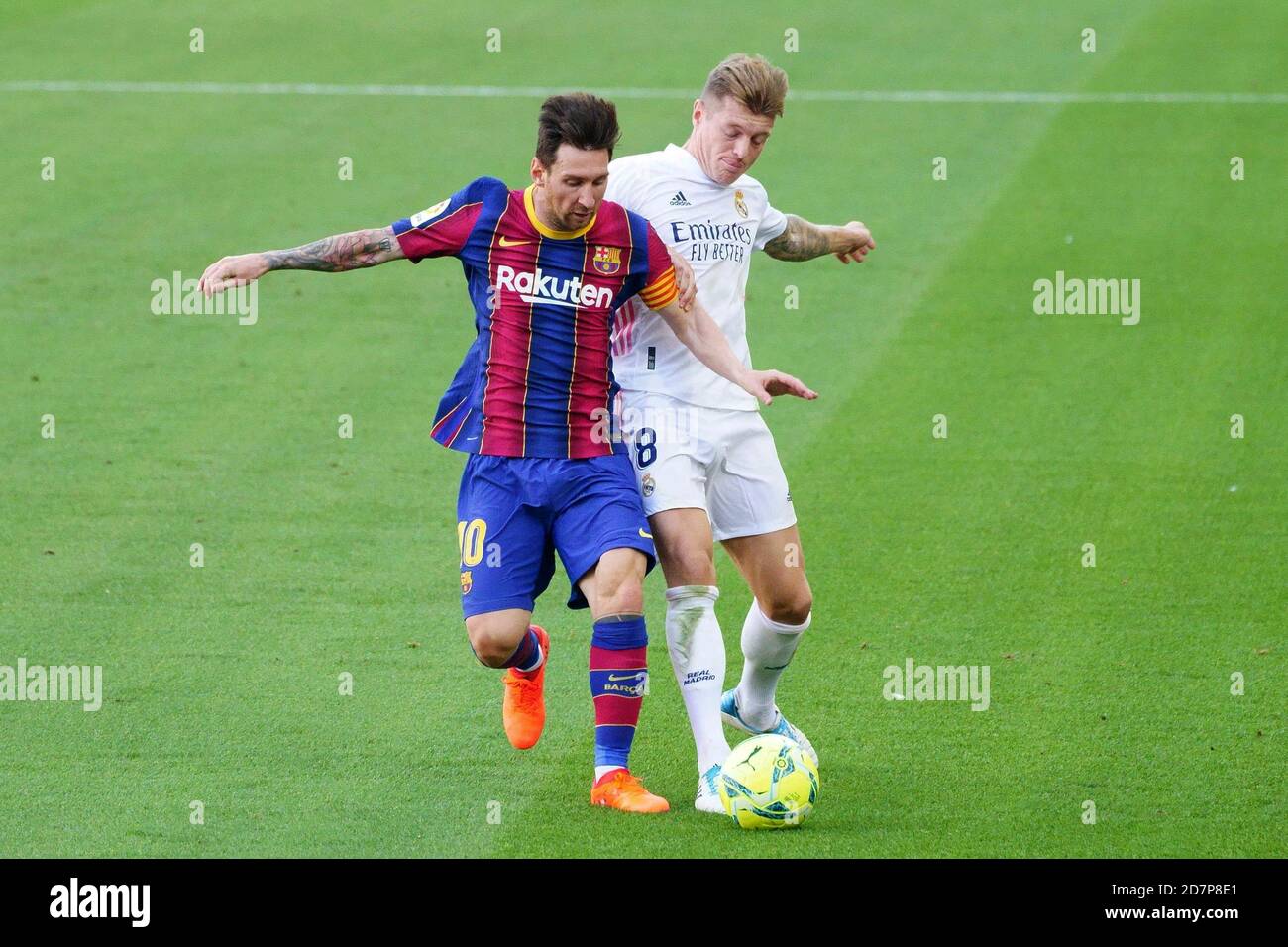 Camp Nou, Barcelona, Catalonia, Spain. 24th Oct, 2020. La Liga Football, Barcelona versus Real Madrid; Leo Messi holds off the challenge from Toni Kroos of Real Credit: Action Plus Sports/Alamy Live News Stock Photo