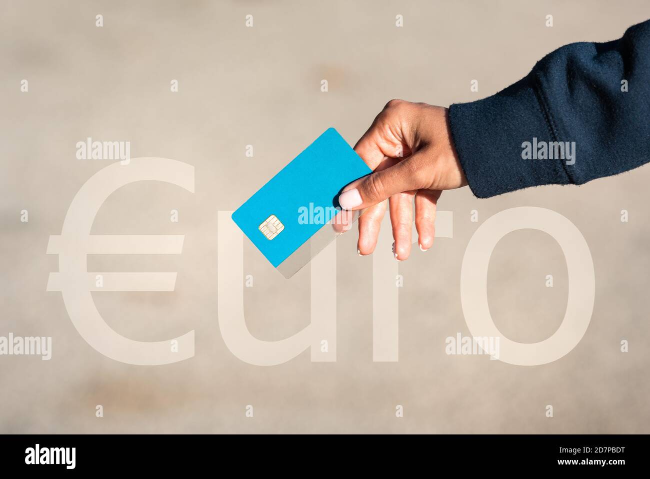 Close up of isolated euro credit or debit card. Woman hand with credit card. Stock Photo