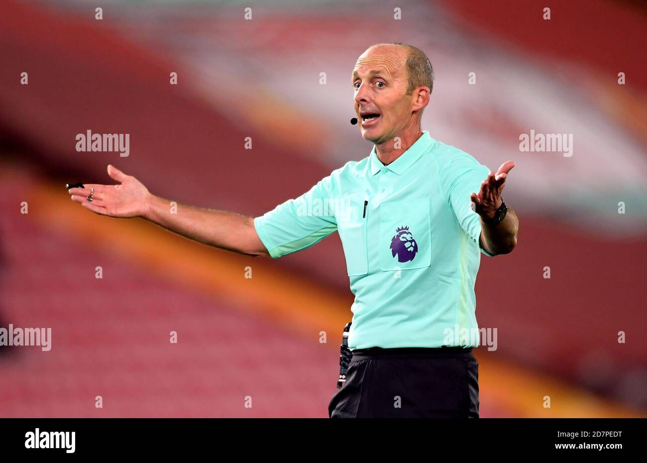Referee Mike Dean during the Premier League match at Anfield, Liverpool. Stock Photo
