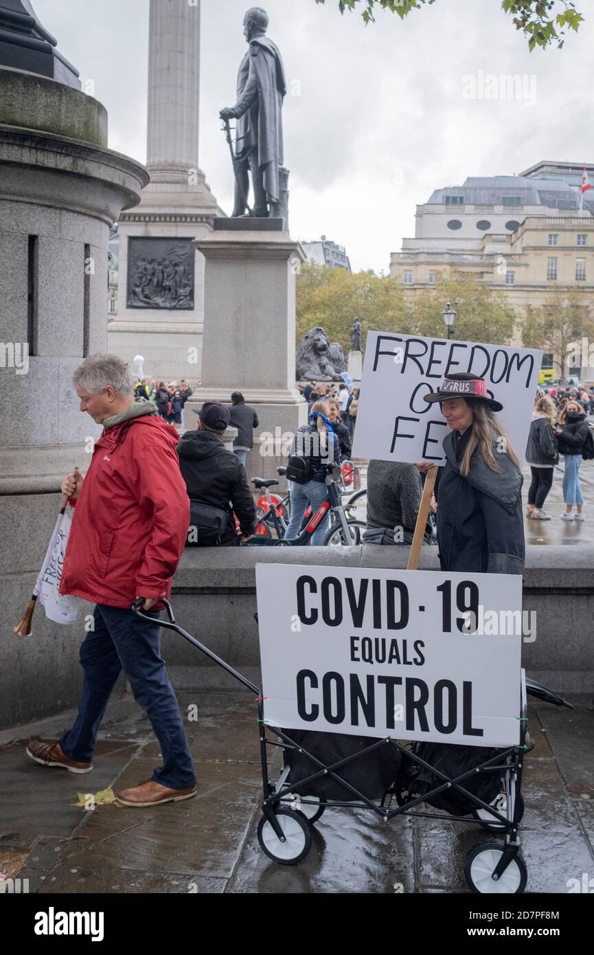 During the second wave of the Coronavirus pandemic, anti-lockdown protesters disregard social distancing rules or adhere to the terms of their own risk assessment, during their march through central London and into Trafalgar Square, on 24th October 2020, in London, England. Eighteen people were arrested at the protest where they called for a return of their freedoms. Stock Photo