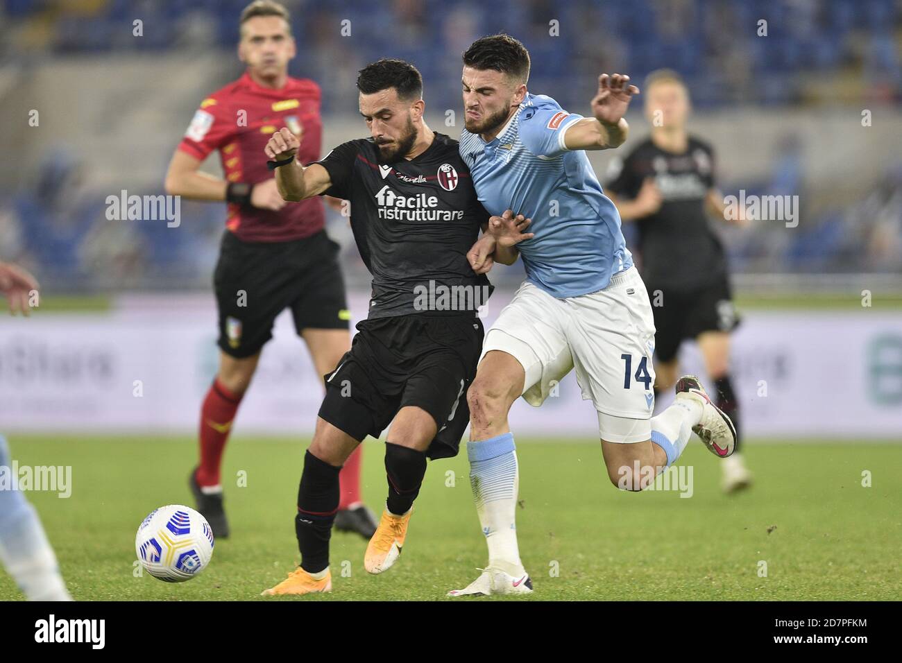 ROME, ITALY - October 24 Nicola Sansone (L) of Bologna FC in action against  Wesley Hodet (R) of Lazio during the Serie A soccer match between SS Lazio  Bologna FC Stadio Olimpico on October 24,2020 in Rome Italy  Credit: LM/Claudio Pasquazi/Alamy Live News Stock Photo