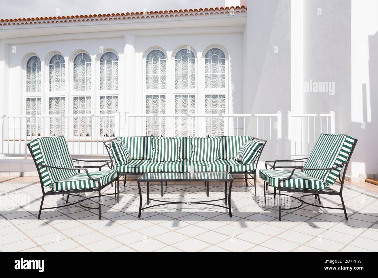 Table and chairs on a terrace, outdoor living in summer, Tenerife, Canary Islands Stock Photo