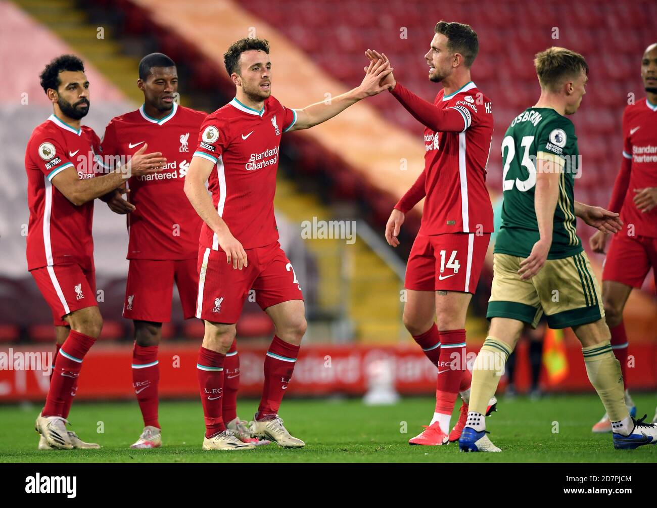 Liverpool's Diogo Jota celebrates scoring his side's second goal of the game with his team-mates during the Premier League match at Anfield, Liverpool. Stock Photo