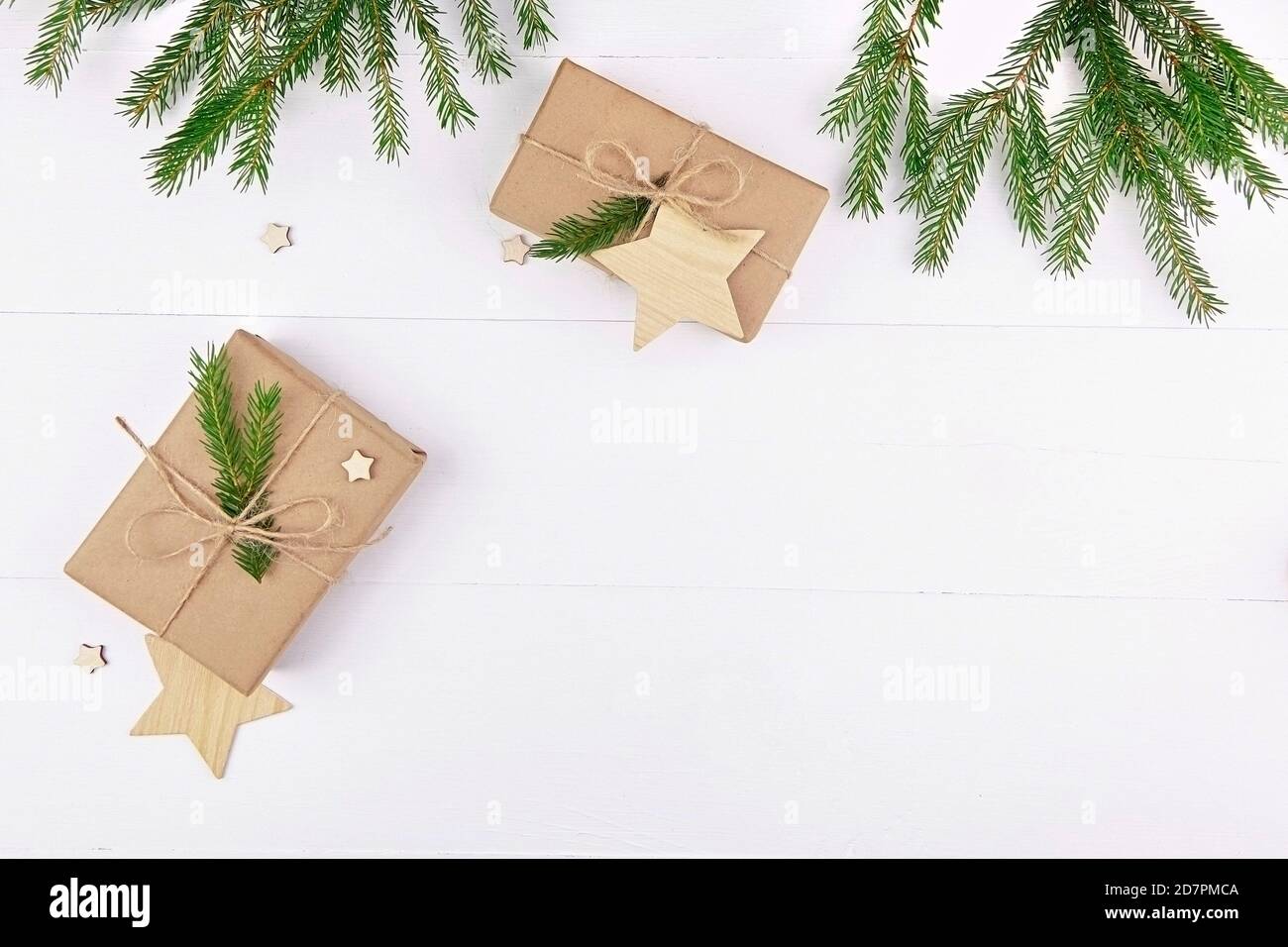 Christmas flat lay composition - decorated gift boxes with fir tree ...
