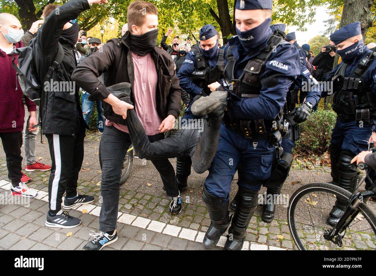 Police officers arrest the provocateur during the demonstration.The Constitutional Tribunal examined the motion of a group of deputies regarding the so-called eugenic abortion. In the opinion of the Tribunal, such an abortion, performed in the event of suspicion of severe fetal defects, is inconsistent with the Constitution. Women protest against the decision. Stock Photo