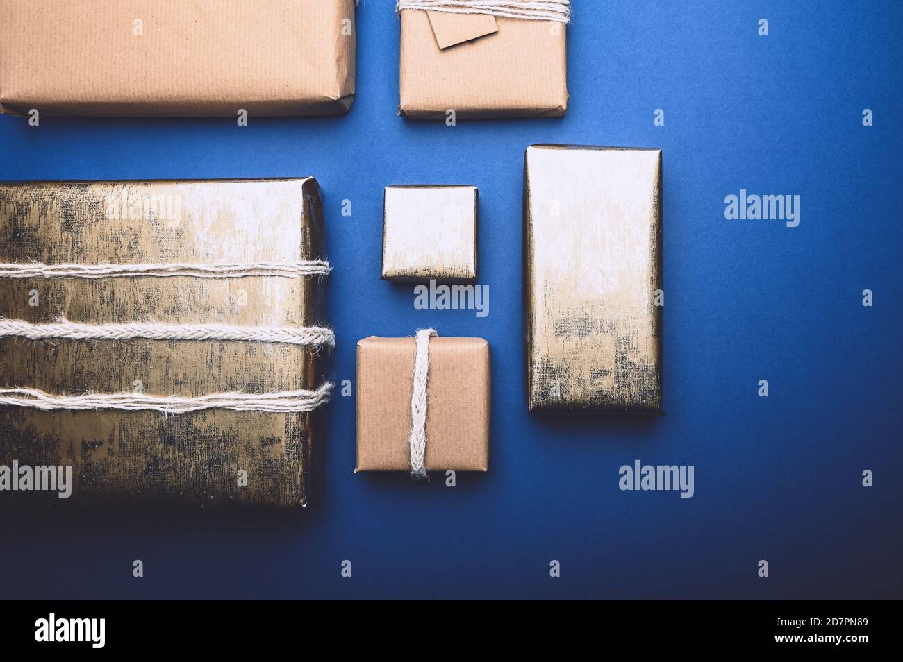 Eco friendly gifts wrapped in brown paper Stock Photo Alamy