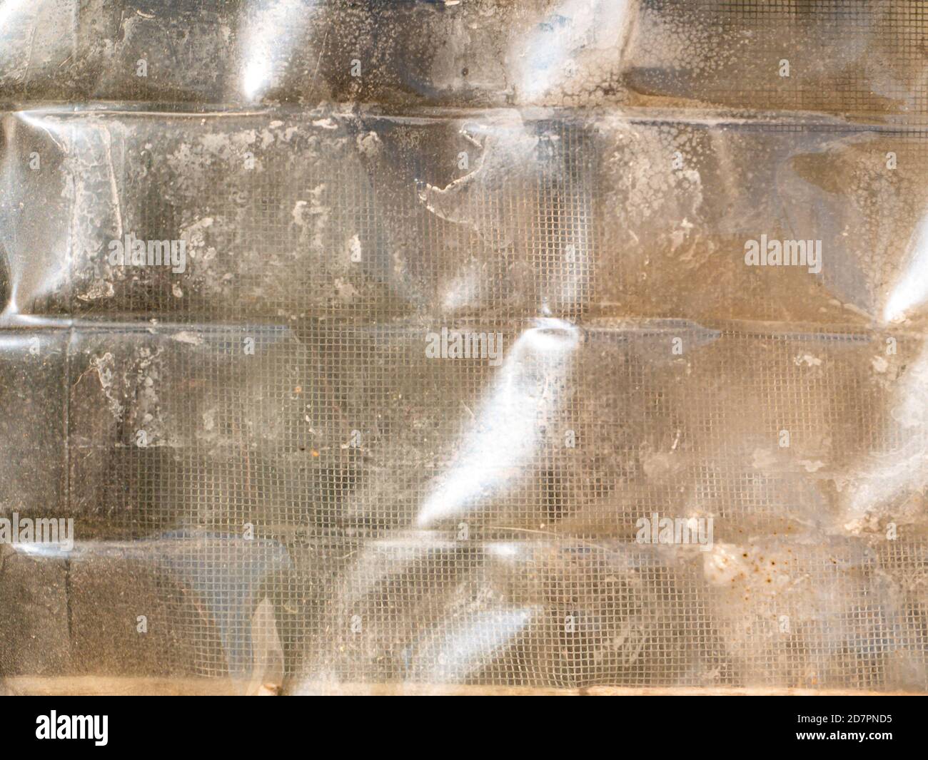 The texture of the transparent surface of the plastic container. Stock Photo